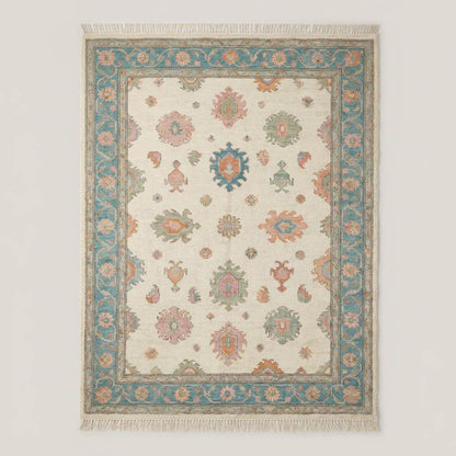 Vintage style Oushak area rug with muted floral motifs and pastel tones for neutral home decor __etsy:7931105979