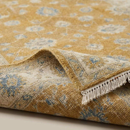 Close-up of hand knotted wool rug texture showing individual knots and soft floral Oushak weaving pattern __etsy:7855079425
