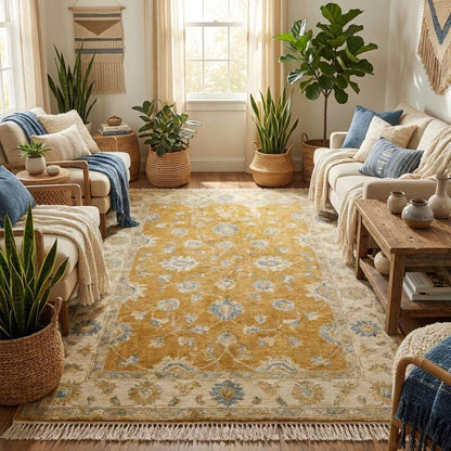 Large mustard gold floral Oushak rug styled under accent chair in modern living room __etsy:7855079391