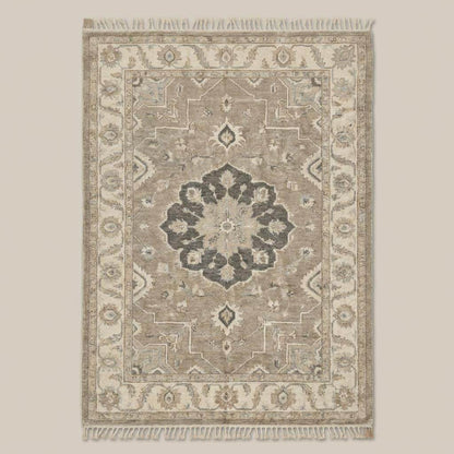 Neutral beige and gray wool area rug with soft vintage inspired Oushak pattern