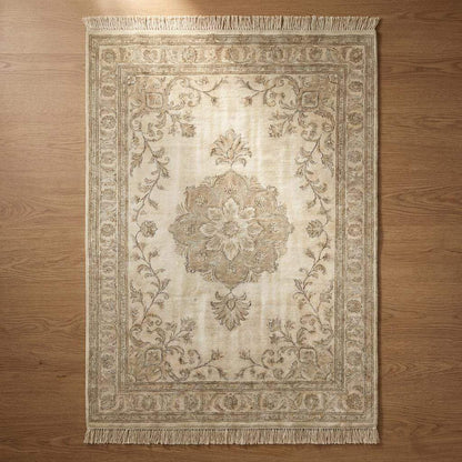 Oushak style hand knotted wool rug with soft blue floral medallion and neutral tones