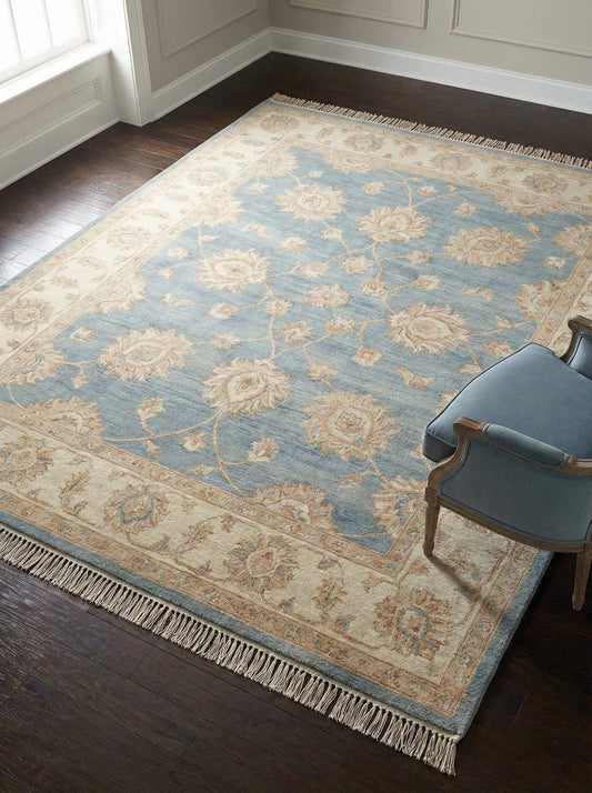 Hand knotted Oushak style wool area rug in soft blue with ivory floral border __etsy:7705545437