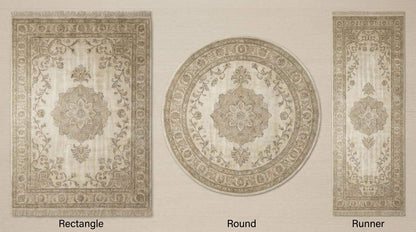 Soft blue Oushak style hand knotted wool rug with floral medallion design and neutral tones
