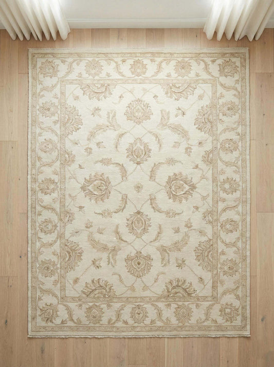 Hand-knotted Oushak style wool area rug with neutral floral design and soft wool pile for durable, elegant home decor