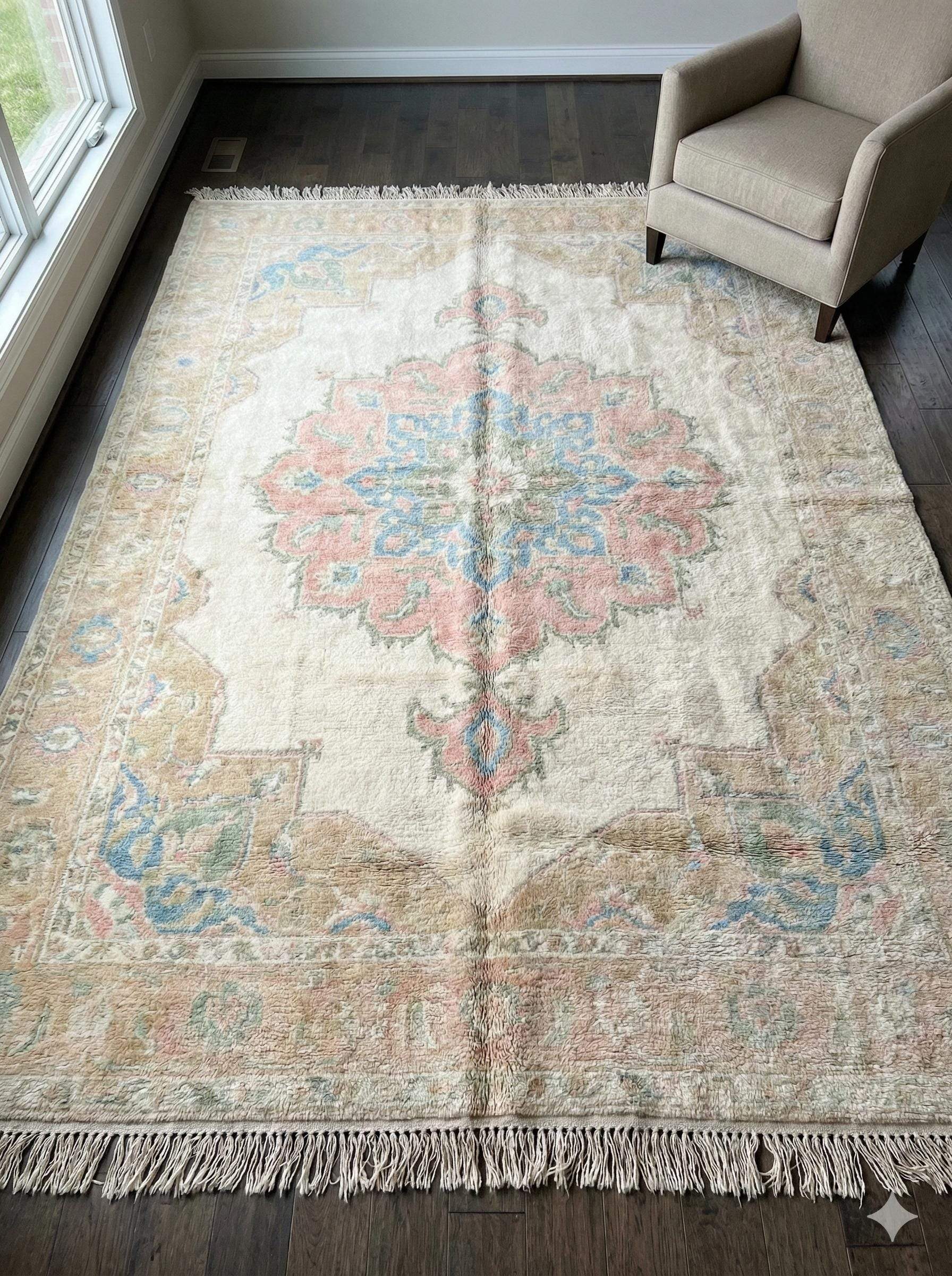 Hand knotted pastel Oushak area rug with wool medallion design for living room