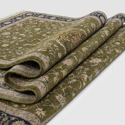 Close up of hand knotted wool pile showing dense knot texture and floral pattern detailing