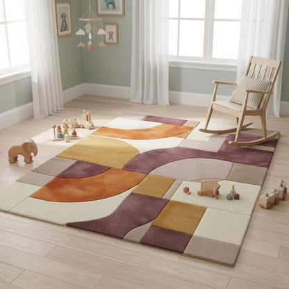 Plush hand tufted abstract area rug with retro geometric design in mauve, lilac, peach, terracotta, mustard, and cream tones