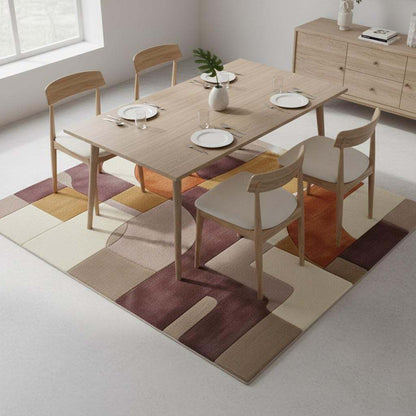 Plush hand tufted abstract area rug with geometric retro color blocks in mauve, lilac, peach, terracotta, mustard, and cream tones