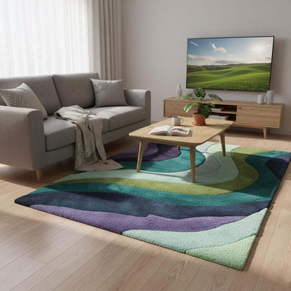 Hand tufted retro area rug with teal aqua geometric wave pattern in plush soft 70s style carpet