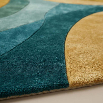 Retro abstract wave wool rug in teal, mustard, aqua, and brown with hand-tufted plush texture for modern living room and bedroom decor