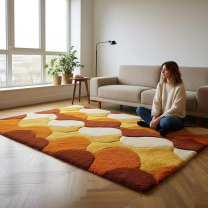 Retro shag rug with hand-tufted wool geometric circles in 70s burnt orange and brown tones
