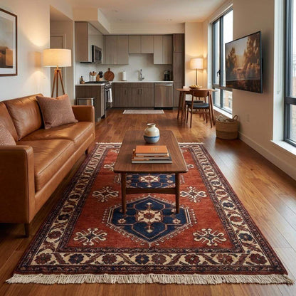 Rust red tribal hand knotted wool rug with geometric Kazak design for living room decor