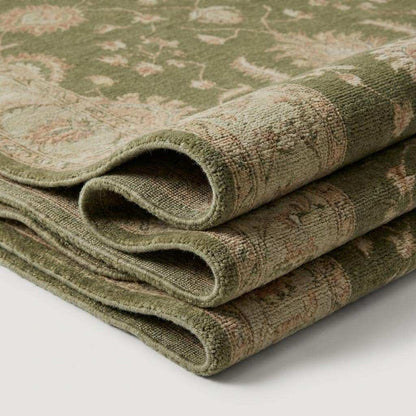 Sage green Oushak hand-knotted wool area rug with vintage floral motifs and antique-inspired palette
