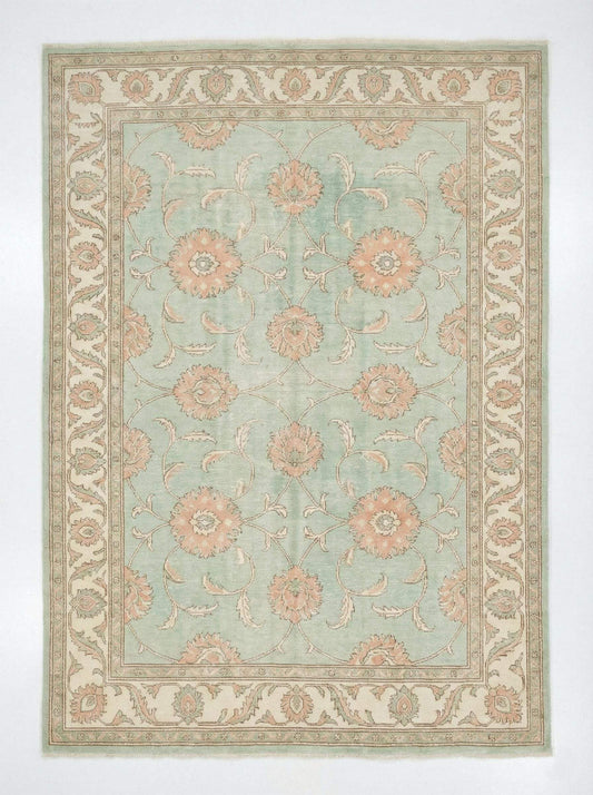 Hand knotted sage green Oushak wool rug with floral Turkish design