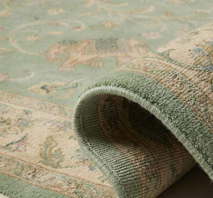 Close-up of hand-knotted wool pile showing dense knots and natural fiber texture