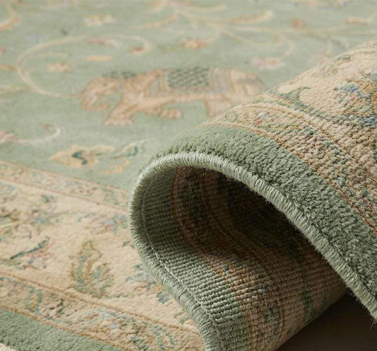 Close-up of hand-knotted wool pile showing dense knots and natural fiber texture