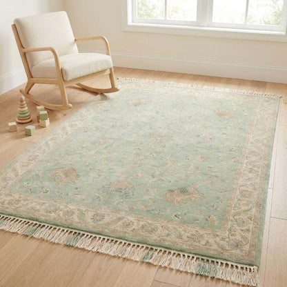 Hand-knotted wool rug highlighting detailed border and artisan craftsmanship