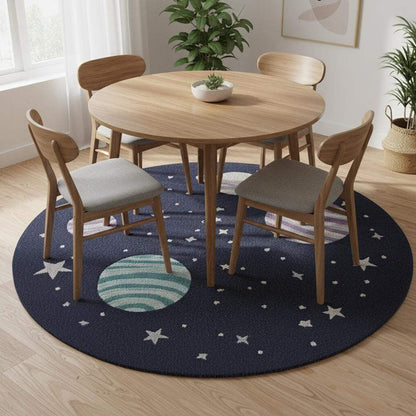 Space theme round rug with astronaut and planet design in navy blue wool for nursery decor