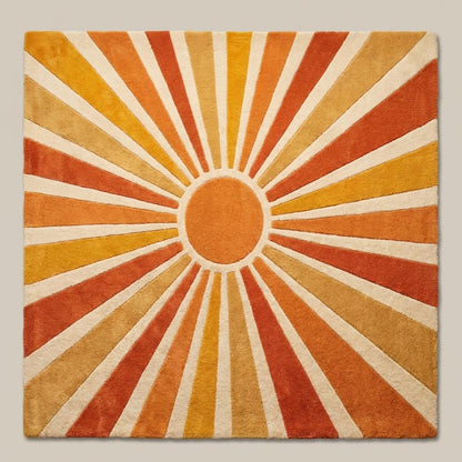 Retro sunburst geometric wool area rug with bold radiating lines in orange rust mustard and cream mid century modern style