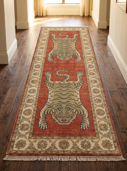 Hand knotted Tibetan tiger runner rug featuring two tiger motifs on a rust red background with decorative floral borders and handmade wool craftsmanship. __etsy:8100395708