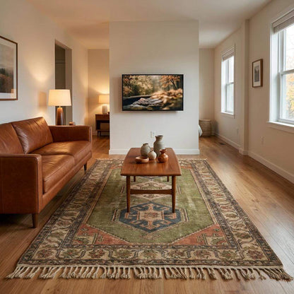 Tribal hand knotted wool rug with geometric Oushak medallion design in earthy olive and rust tones