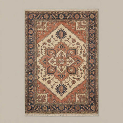 Traditional Oushak style hand knotted rug placed on wooden floor in rustic living space