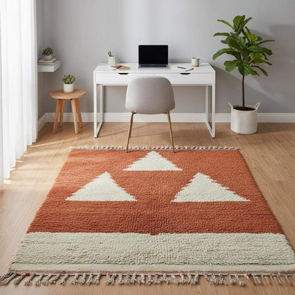 Handmade wool Moroccan rug rust terracotta and cream, geometric triangle motif, perfect for eclectic interior décor.