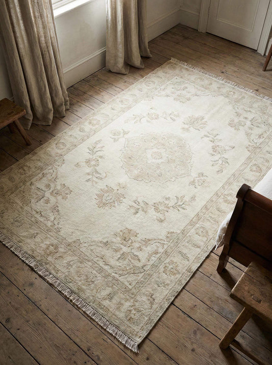Vintage neutral area rug hand knotted Oushak wool with floral medallion design