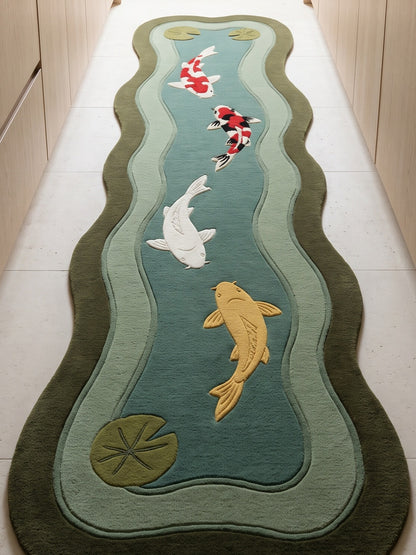 Koi Fish Runner Rug in hand-tufted wool with four carved koi in red, white, black and gold swimming down a teal pond, with lily pads, sage ripple bands and an olive wavy edge - view 5