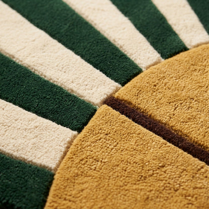 Emerald Art Deco Fan Round Rug in hand-tufted wool with emerald green and ivory sunburst rays, a mustard fan base and a scalloped round edge - view 4
