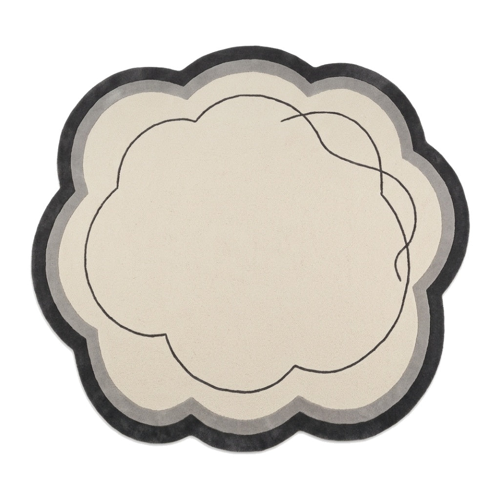 Ivory Cloud Rug in hand-tufted wool with a scalloped flower shape, ivory field, charcoal and grey border and a flowing carved charcoal line - view 2