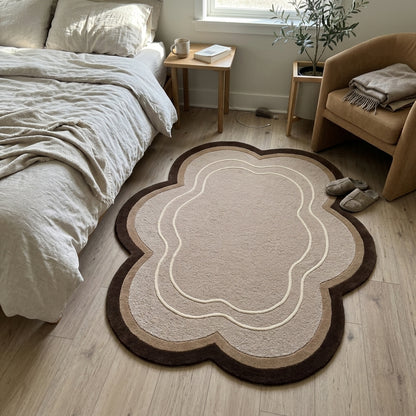 Beige Cloud Rug in hand-tufted wool with a scalloped flower shape, textured beige field, brown and taupe border and two raised ivory contour lines - view 3