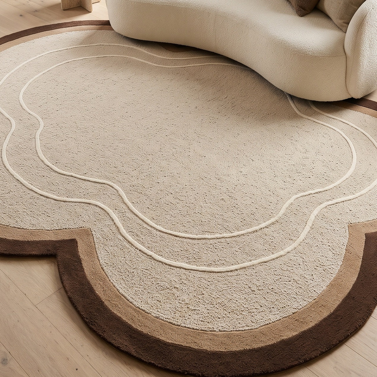 Beige Cloud Rug in hand-tufted wool with a scalloped flower shape, textured beige field, brown and taupe border and two raised ivory contour lines - view 5