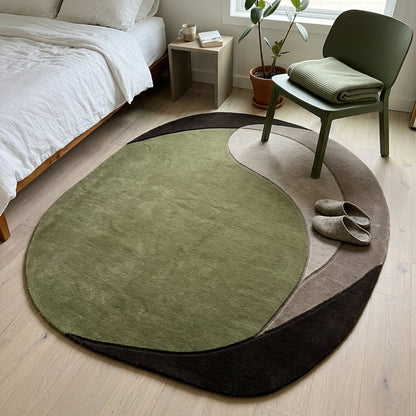 Olive Green Abstract Rug in hand-tufted wool with a large olive green shape, sweeping taupe and mushroom crescents and a dark brown base, in an organic oval shape - view 3