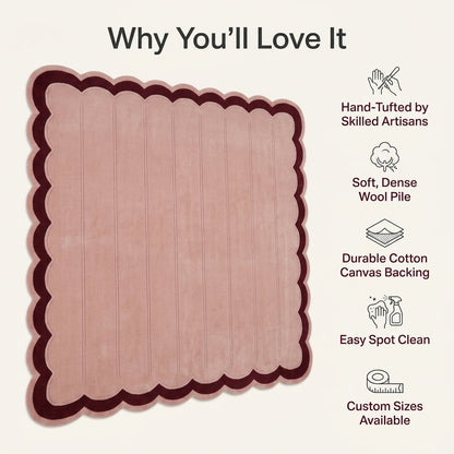 Blush Pink Fluted rug with a soft wool pile, carved vertical channels, and a deep burgundy scalloped border.