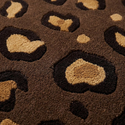 Brown Leopard Rug with plush brown wool pile, black rosettes and tan centres in a raised animal print pattern