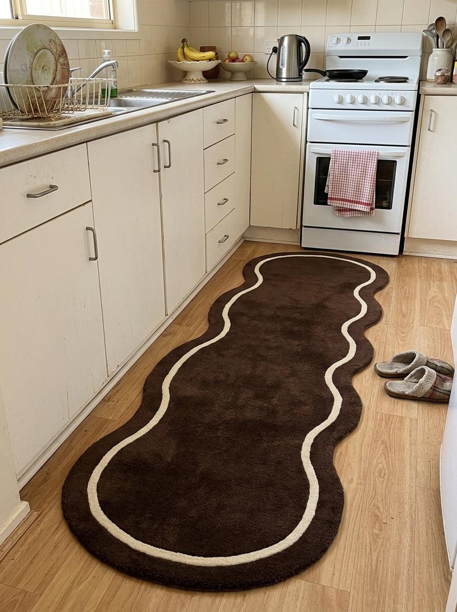 Brown Wavy Runner Rug in chocolate brown with a soft pile and an ivory wavy outline around its organic shape