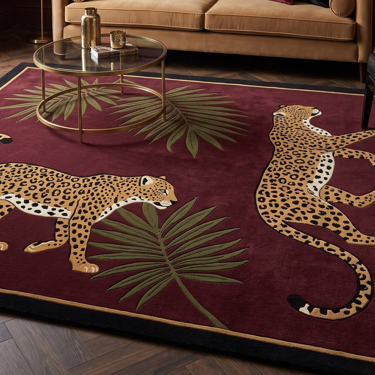 Burgundy Leopard Rug with tan spotted leopards and olive palm fronds on a deep wine-red ground with black and gold edging