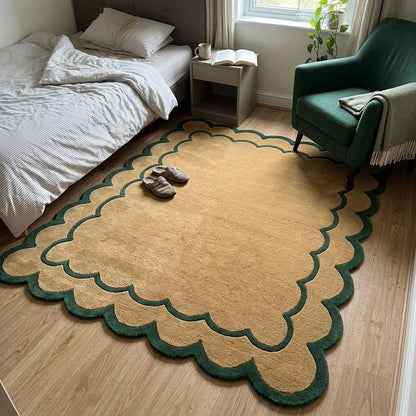 Camel & Forest Green Scalloped Hand-Tufted Wool Rug with a plush camel field, fine green outline and deep scalloped edge.