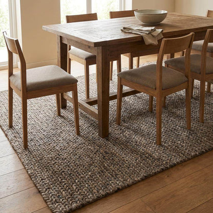 Chunky wool area rug with thick braided texture in neutral brown for modern farmhouse decor