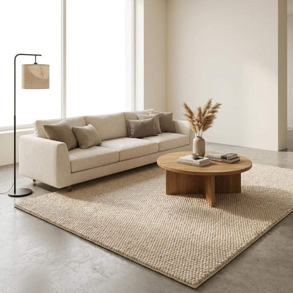Chunky wool rug with thick handwoven loop pile in neutral cream for cozy minimalist decor