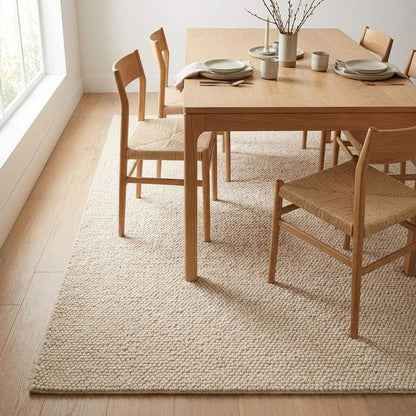 Chunky wool rug with thick loop pile in neutral cream for cozy minimalist home decor