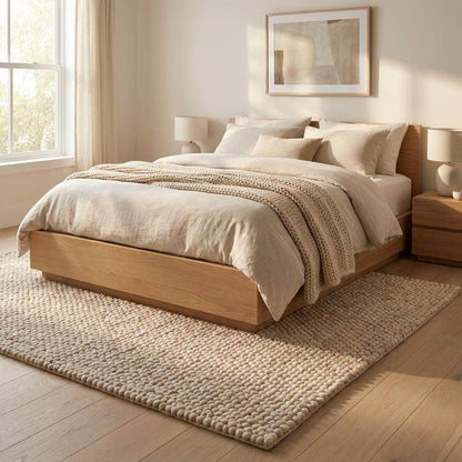 Handmade chunky wool rug with thick knit texture in neutral beige for cozy living room and bedroom decor