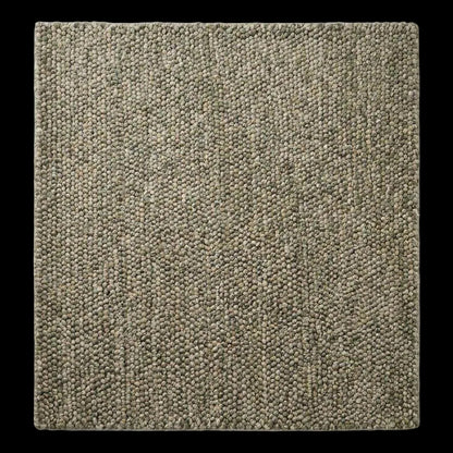 Handmade chunky wool rug with neutral pebble texture, Scandinavian style, perfect for cozy modern farmhouse decor