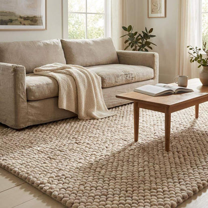 Handmade chunky wool rug with thick knit texture in neutral beige for cozy living room and bedroom decor