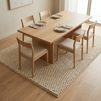 Chunky Wool Rug in oatmeal and beige melange, with a thick handwoven surface of neat raised pebble rows.