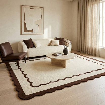 Wool rug with a cream field, chocolate scalloped inner line and wide brown border; Cream & Chocolate Scalloped Border design.