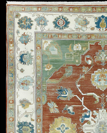 Vintage distressed terracotta medallion rug with intricate floral and vine patterns in teal and rust tones