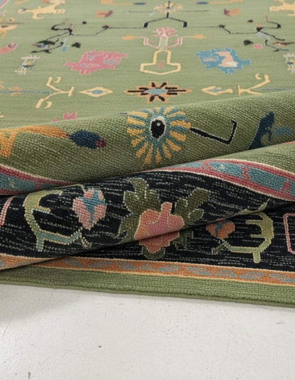 Green abstract knotted area rug with multicolor geometric patterns and retro boho style in rectangular shapes