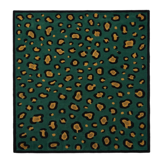Green Leopard Rug with a deep emerald wool surface, black and ochre animal spots, and a solid black border
